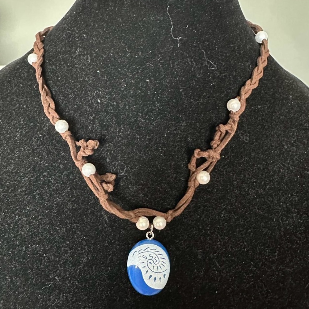 Brown and blue Disney Moana necklace.